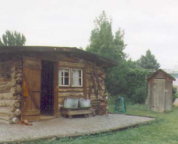 [Aztec Ruins Log House w/ Outhouse]